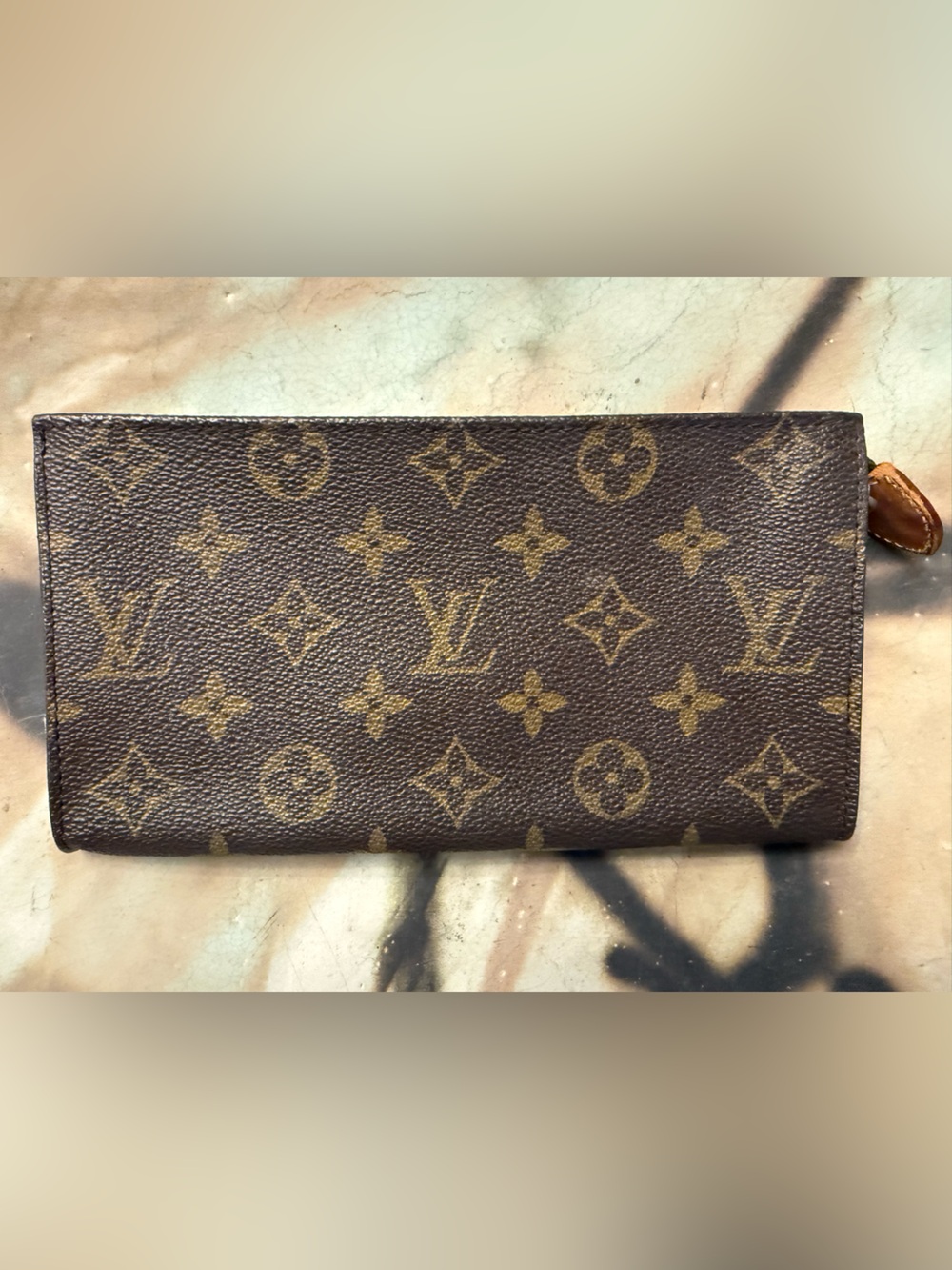 Louis Vuitton Brown Monogram small clutch/makeup Outside is good condition